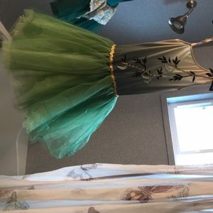 Green and gold dance costume